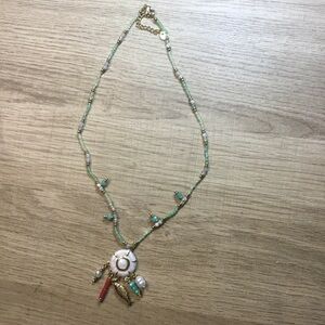 Green Beaded Pendant Necklace with Shell and Multi-Charm Accents